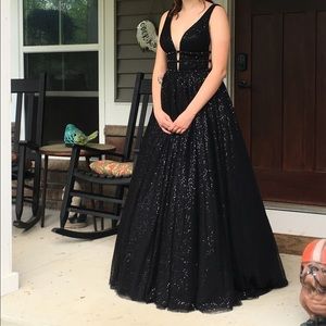 A fall 2018 Sherri Hill ball gown style dress.